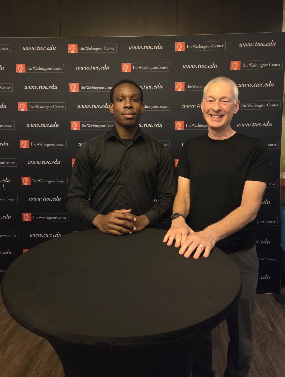 Andy Fisher, with social media intern Chibuzo Okafor, attends The Washington Center's Distinguished Speaker Series at the Residential Academic Facility (RAF) in Washington, D.C. in July 2026