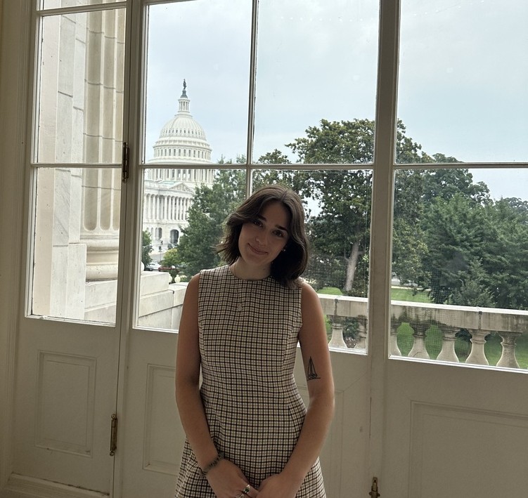 Abby Bendersky at the White House with a view of the U.S. Capitol Building in Washington, D.C.