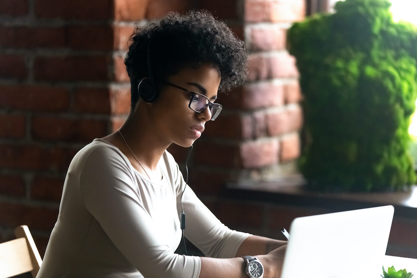 Virtual intern at her computer