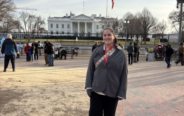Aubrey Collier standing outside of the White House in Washington, D.C.