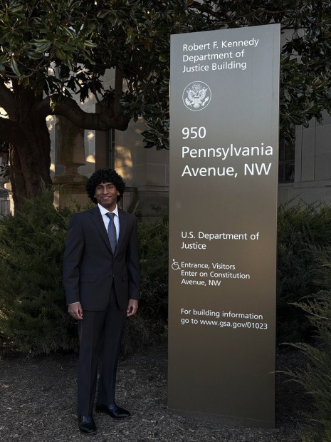Hussein Rifath outside of the Robert F. Kennedy Department of Justice Building