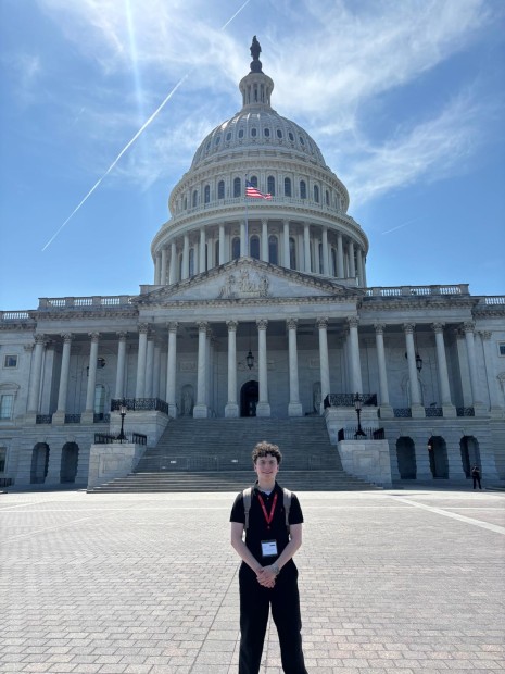 Fotios Meimeteas on Capitol Hill standing outside of the Capitol Building in Washington, D.C.