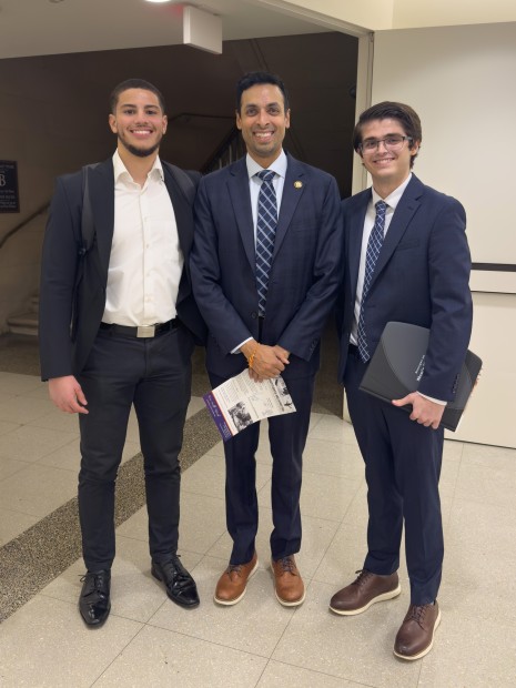 Jack Hartung standing with another intern from The Washington Center and U.S. Representative Suhas Subramanyam