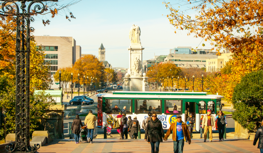 Tourists strolling on Constitutions Ave. in the fall