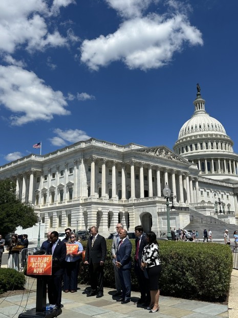 Joe Neguse at a rally in front of the U.S. Capitol Building in Washington, D.C.