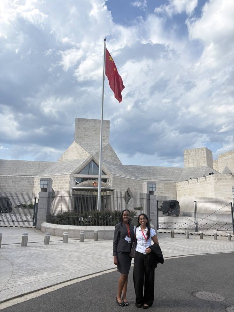 Manali Misra with a fellow student outside of the Embassy of the People's Republic of China in the United States of America