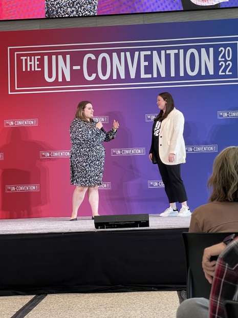 TWC student Addison Peters (R) closes out UnCon22 on stage with Sophie Beren of The Conversationalist Addison Peters On Stage Image